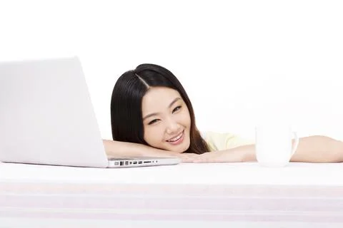 Young woman using computer Stock Photos