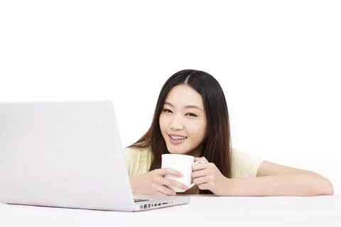Young woman using computer Stock Photos
