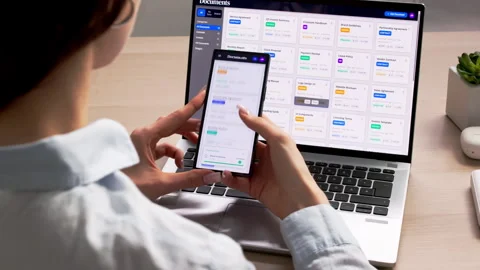 Young Woman Using Document Management Software On Laptop Stock Footage 334534764