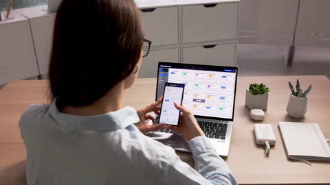 Young Woman Using Document Management Software On Laptop Stock Footage 334927500