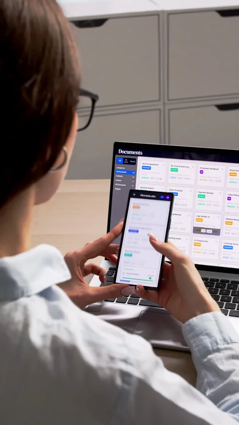 Young Woman Using Document Management Software On Laptop Stock Footage 335881234