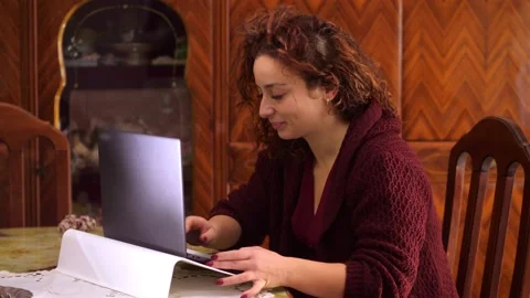 Young woman using laptop computer for remote working Stock Footage 167373675