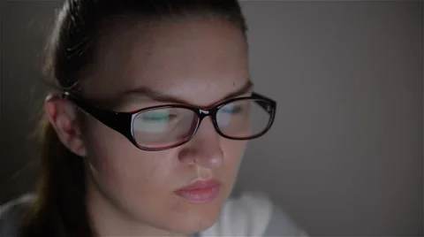 Young woman using notebook computer at night, Beautiful female student studying Stock Footage 64526153
