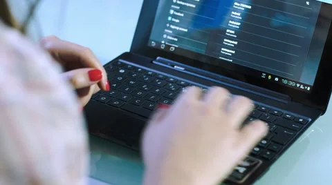 Young woman using notebook: fill out a form on-line: registration, personal data Stock Footage 42990457