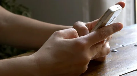 Young woman using old mobile phone texting vintage cellphone Video stock 49951093