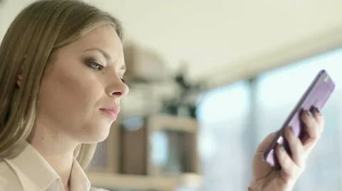 Young Woman Using Smartphone Stock Footage 63305832