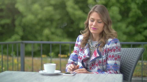 Young woman using a smartphone Stock Footage 64331186