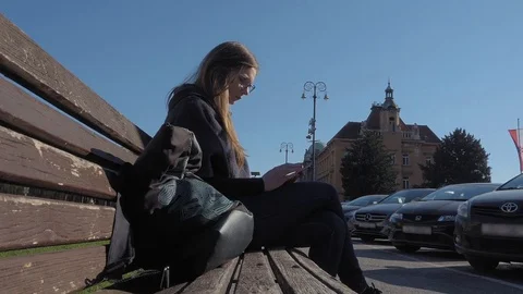 Young woman using smartphone Stock Footage 74184804