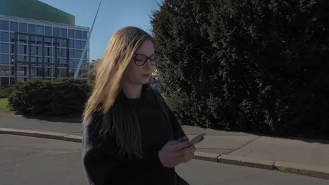 Young woman using smartphone Video stock 74184915