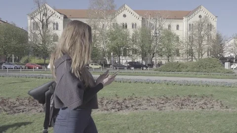 Young woman using smartphone Stock Footage 74341845