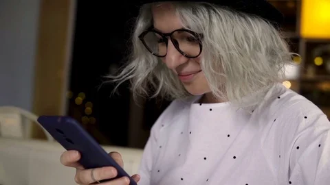 Young woman using smartphone Stock Footage 83205745