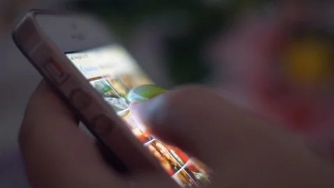 Young woman using smartphone Stock Footage 100976035