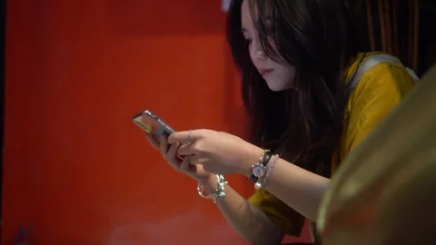 Young Woman Using Smartphone Stock Footage 255308554