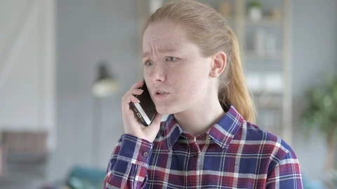 Young Woman Using Smartphone for Scrolling Stock Footage 114790331