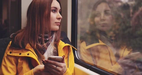 Young Woman Using Smartphone on a Train. SLOW MOTION 4K. 스톡 동영상 140368892