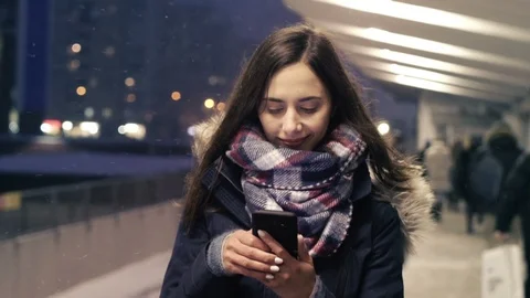 Young Woman Using smartphone while walking down Subway Station. Stock Footage 94860151