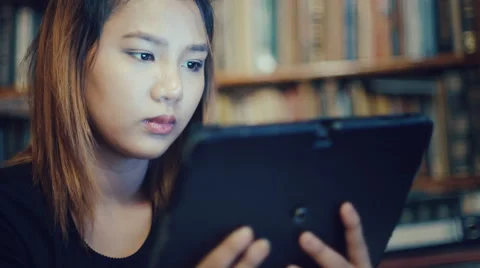 Young Woman using tablet 4k UHD (3840x2160) Stock Footage 61106842