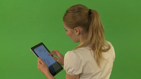 Young woman using tablet. Chroma Key Video stock 35445570