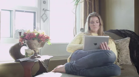 Young Woman using Tablet Computer - Social Media and Internet Usage Stock Footage 49625563