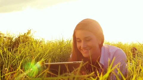 Young Woman Using Tablet Computer Touchscreen. Technology Outdoor Lifestyle. Stock Footage 56025999