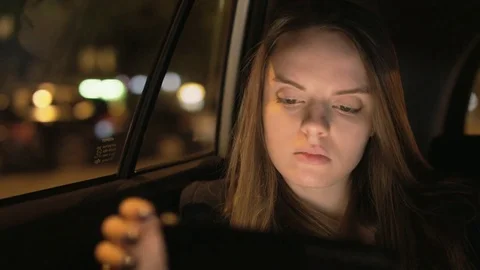 Young Woman Using a Tablet Computer and Thinking Stock Footage 75530623