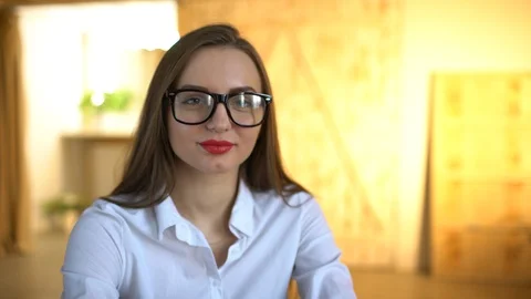 Young woman using tablet computer at office. look at camera. 4 k Stock Footage 85633935