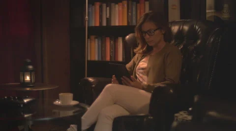 Young woman using a tablet Stock Footage 64547641