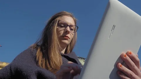 Young woman using tablet Stock-Footage 74184652
