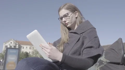 Young woman using tablet Video stock 74340281