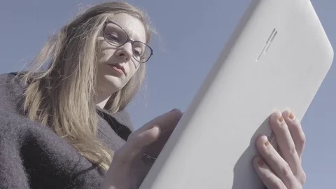 Young woman using tablet Stock Footage 74340382