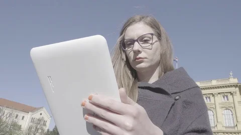 Young woman using tablet Video stock 74340587
