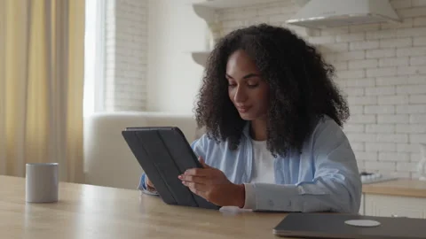 Young Woman Using Tablet For Online Communication And Digital Work Stock Footage 344696956
