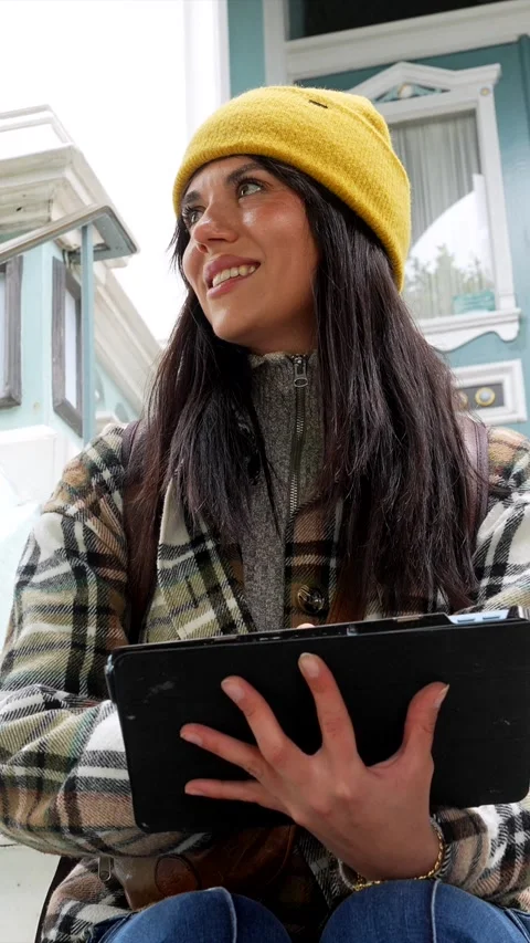 Young woman using a tablet outdoors in san francisco Stock Footage 333105904