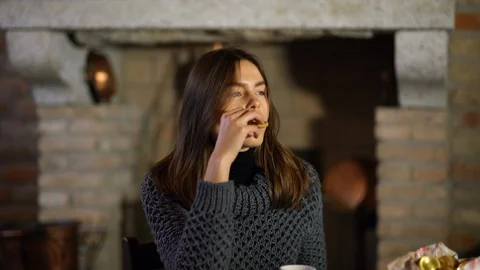 Young woman using a tablet while having breakfast in an agritourism 4k Stock Footage 87686163