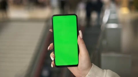 Young Woman Using Touch Screen Mobile Phone. Girl Using Smartphone, Browsing Video stock 193816981