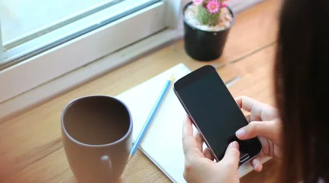 Young woman using touchscreen mobile phone. Stock-Footage 52767238