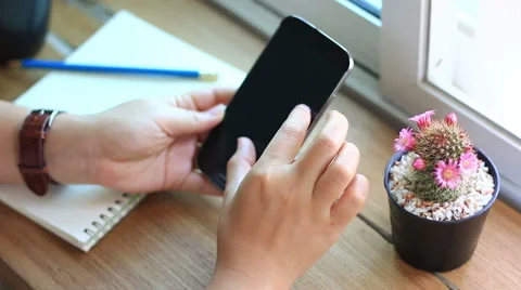 Young woman using touchscreen mobile phone. Stock Footage 52774246