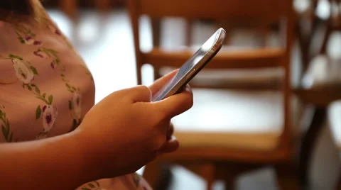 Young woman using touchscreen mobile phone. Stock Footage 52898007