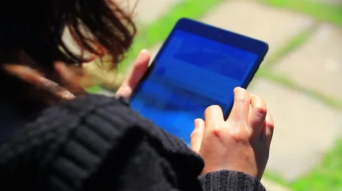 Young woman using touchscreen tablet. Stock Footage 46212419