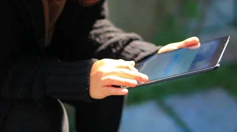 Young woman using touchscreen tablet. Stock Footage 46286435