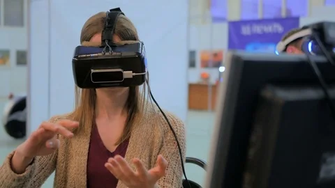 Young woman using virtual reality glasses Stock Footage 72620265