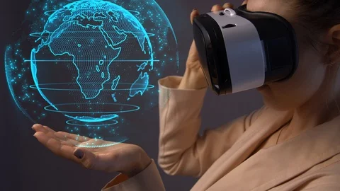Young woman using a virtual reality headset Видео 105313575