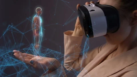 Young woman using a virtual reality headset Видео 105377283