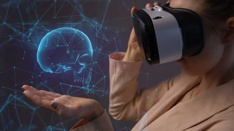 Young woman using a virtual reality headset Видео 105377420
