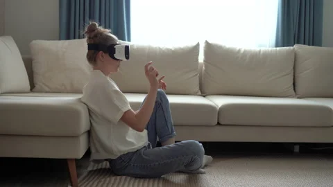 Young woman using virtual reality headset play game. Concept of virtual reality Stock Footage 157401735