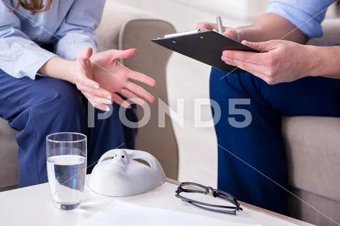 Young woman visiting male psychologist for unreciprocated love Stock Photos