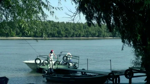 Young woman waiting on the pontoon Stock Footage