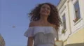 The young woman walk on the street. Slow motion. Wide angle 4k or 4k+ Resolution