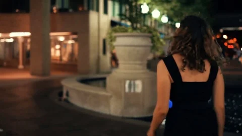 Young woman walking around exploring Georgetown Harbor neighborhood Stock Footage 80208322