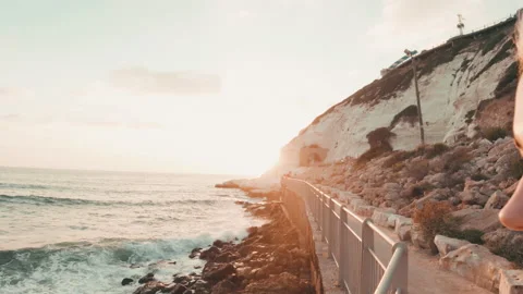 Young Woman Walking Beach At a Sunset Video stock 136021753